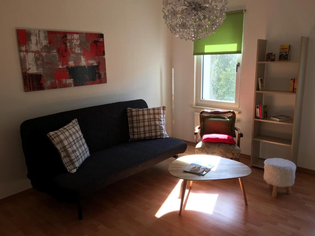 En sittgrupp på Ferienwohnung über dem Ilmpark