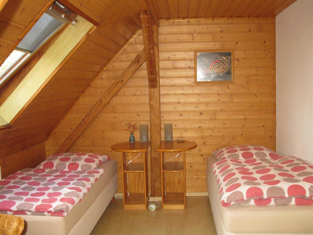 Postel nebo postele na pokoji v ubytování Pension Köthen