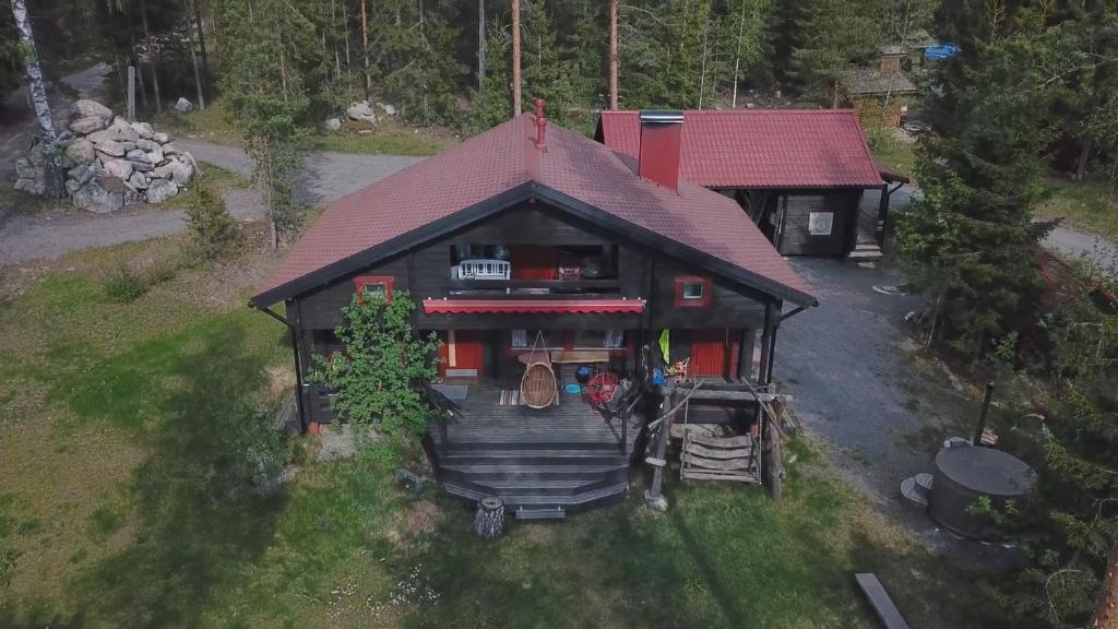 an aerial view of a house with a porch at Pistoretki Toivakka in Toivakka