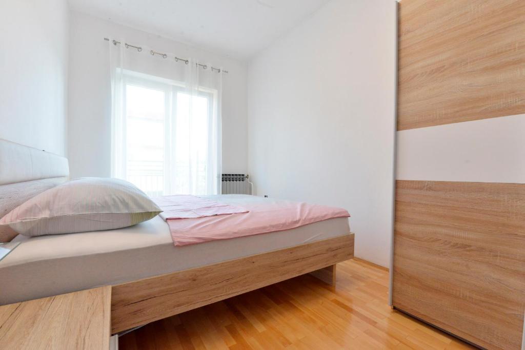 Posteľ alebo postele v izbe v ubytovaní Apartman Meri Pula