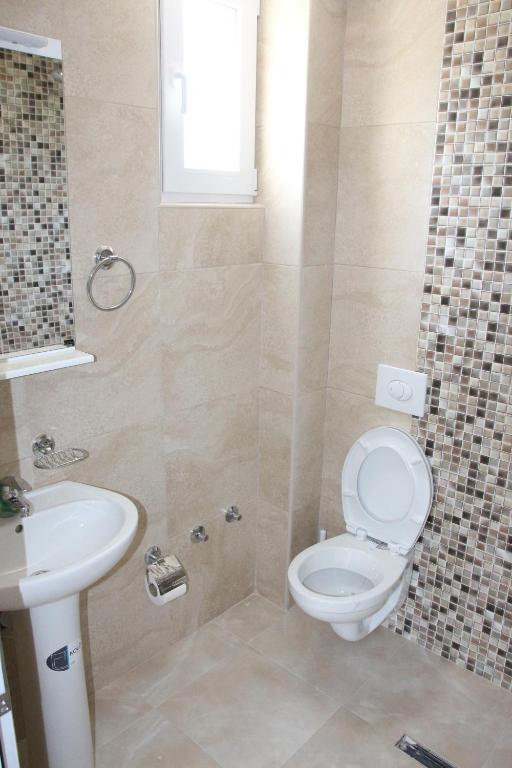 Koupelna v ubytování Zigovic Apartmani