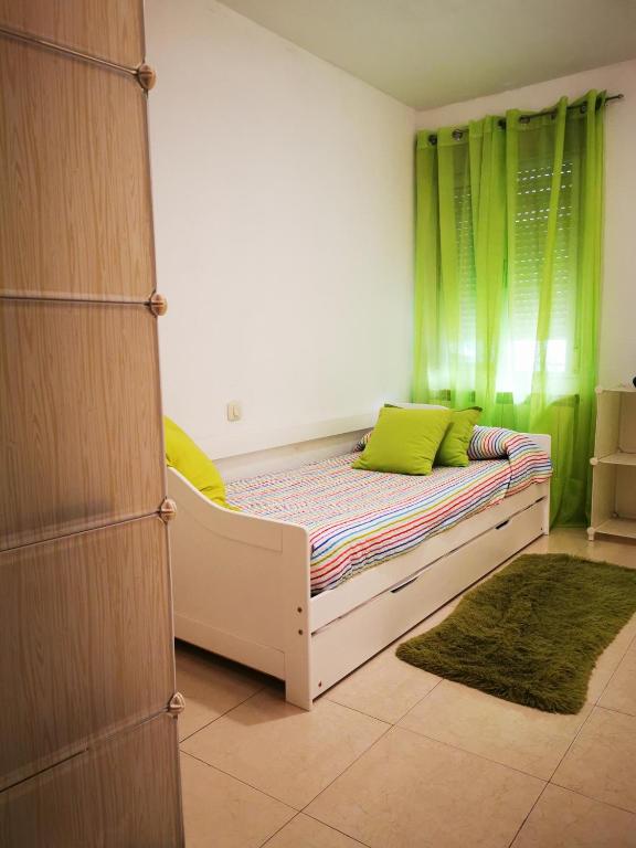 Postel nebo postele na pokoji v ubytování Malocar