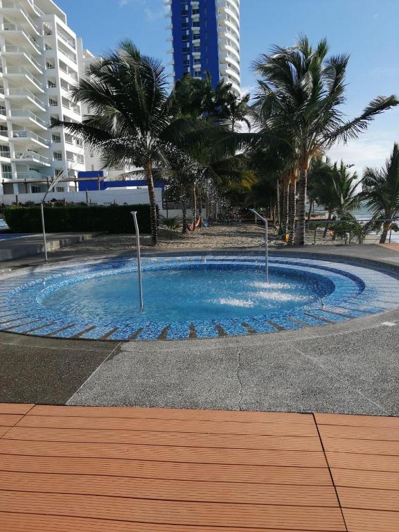 Bazén v ubytování Resort Playa Azul Departamentos frente al mar nebo v jeho okolí