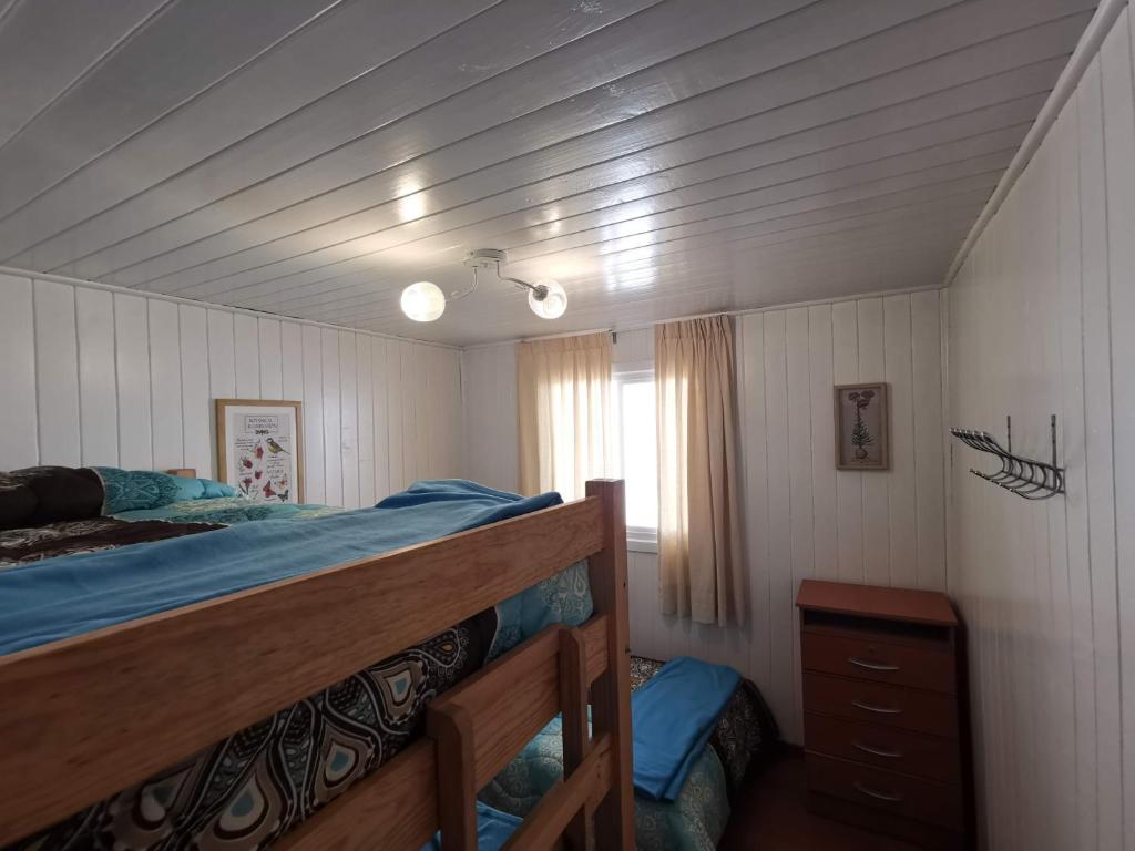 Våningssäng eller våningssängar i ett rum på Casas Isla Negra