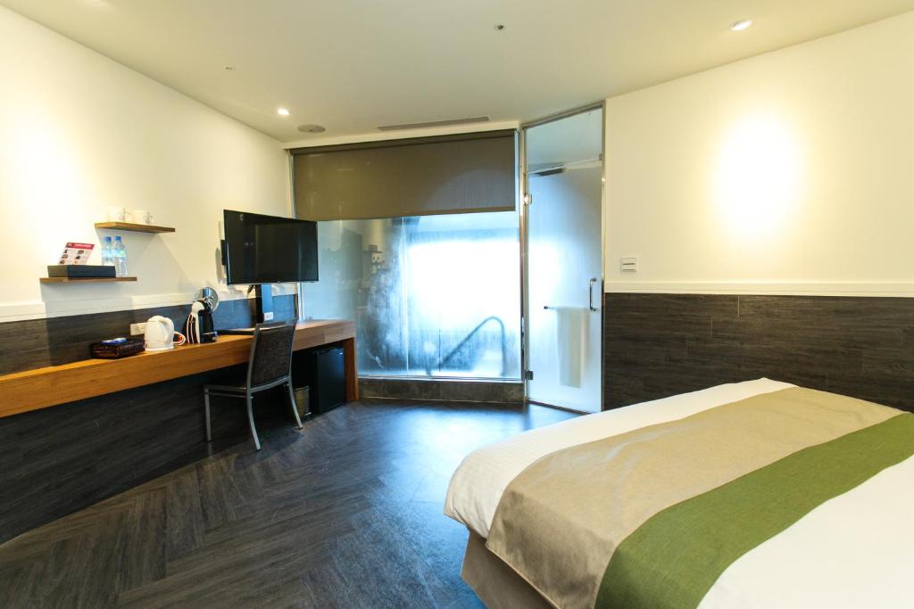 Kuchyň nebo kuchyňský kout v ubytování Yang Ming Shan Tien Lai Resort & Spa
