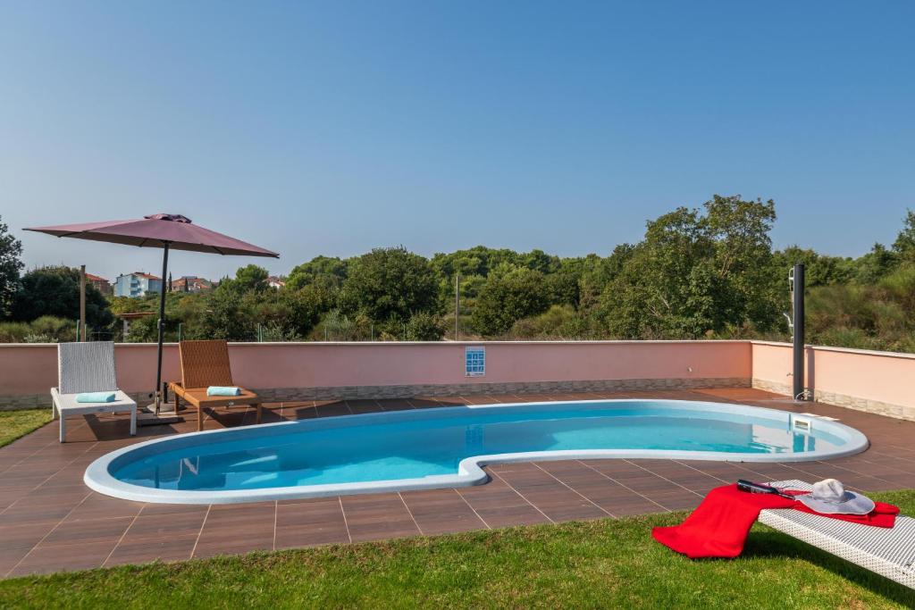 Bazén v ubytování Ferienhaus Joy nebo v jeho okolí