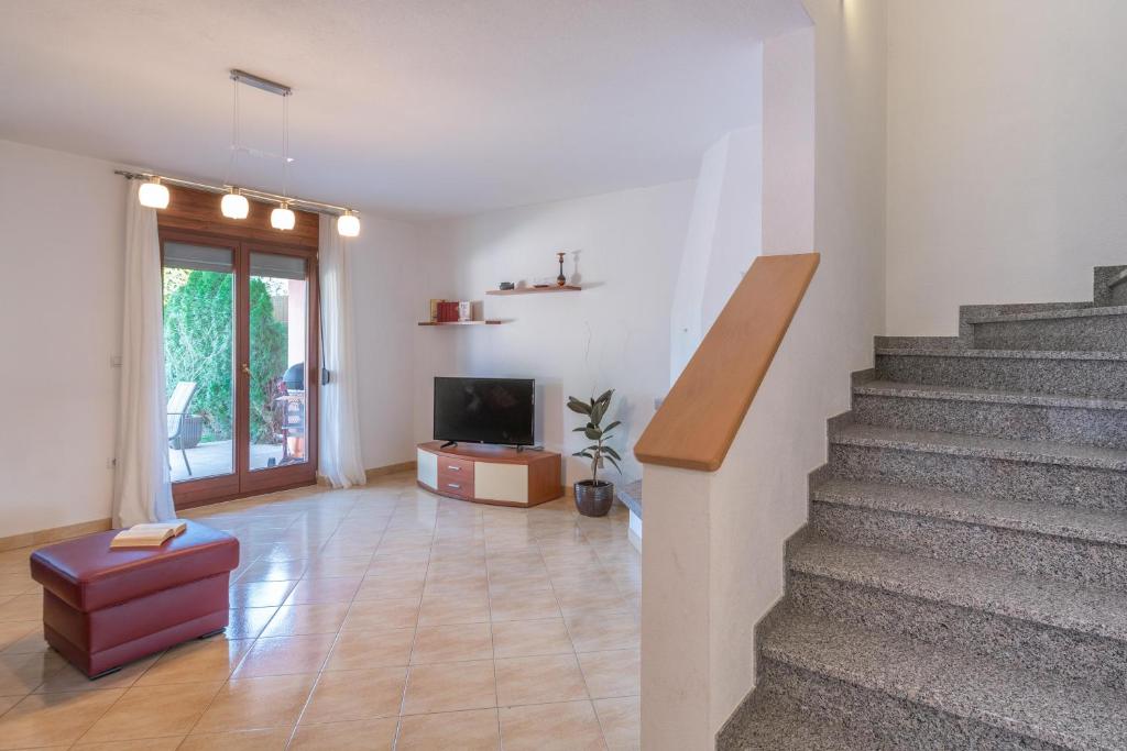 TV a/nebo společenská místnost v ubytování Ferienhaus Joy