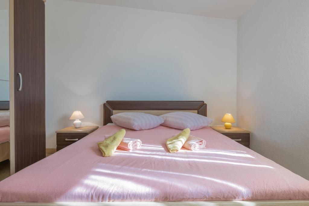 Postel nebo postele na pokoji v ubytování Ferienhaus Joy
