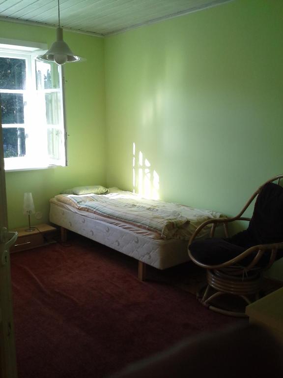 Postel nebo postele na pokoji v ubytování Koidu Homestay
