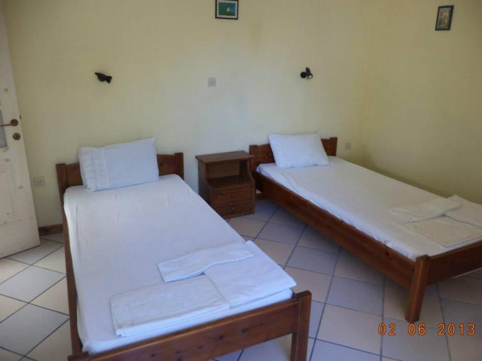 Posteľ alebo postele v izbe v ubytovaní Rigos Apartments