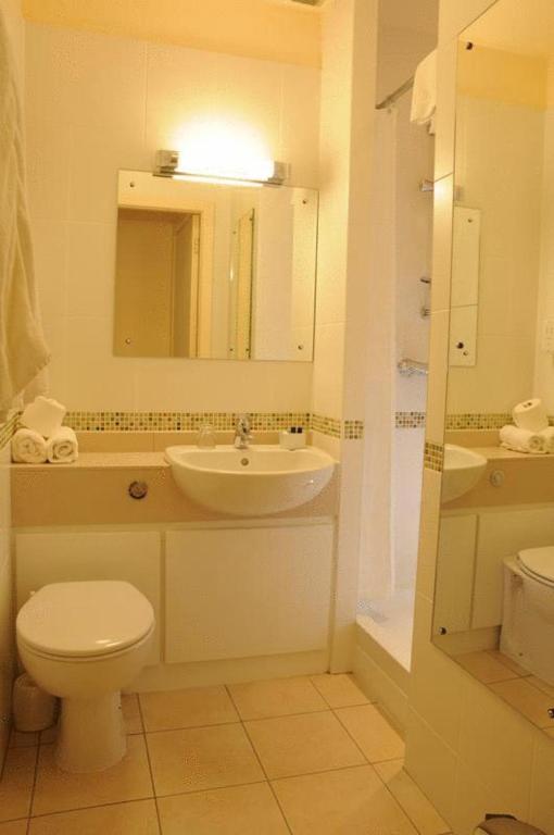 Koupelna v ubytování Sefton Express Hotel