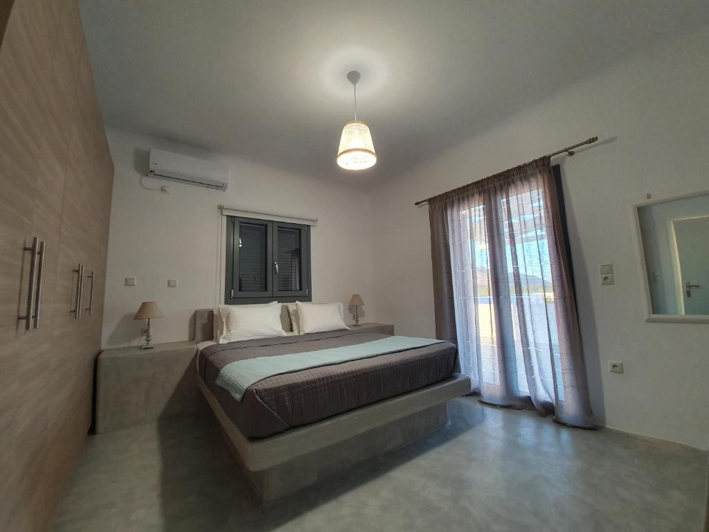 Postel nebo postele na pokoji v ubytování Villa Therme Athena