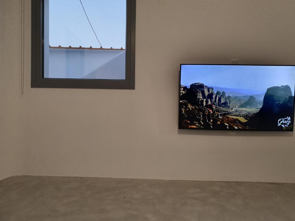 TV a/nebo společenská místnost v ubytování Villa Therme Athena