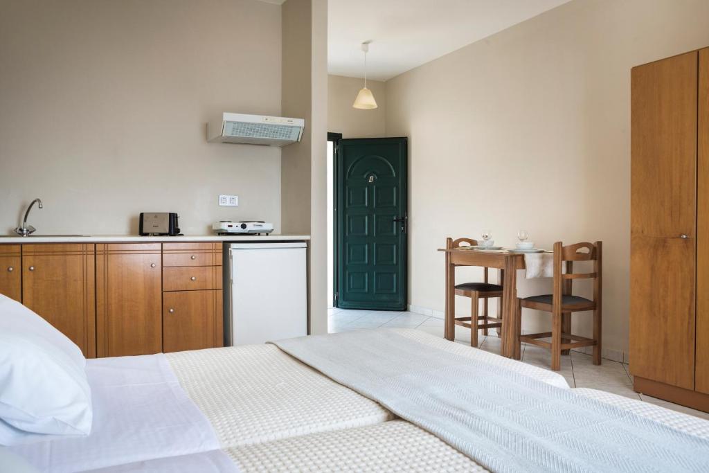 Kuchyň nebo kuchyňský kout v ubytování Antonia Hotel