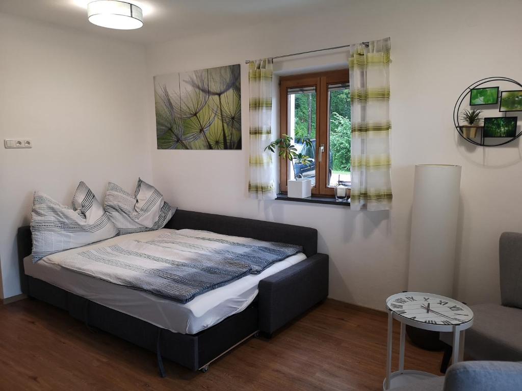 Postel nebo postele na pokoji v ubytování LaWie am Attersee