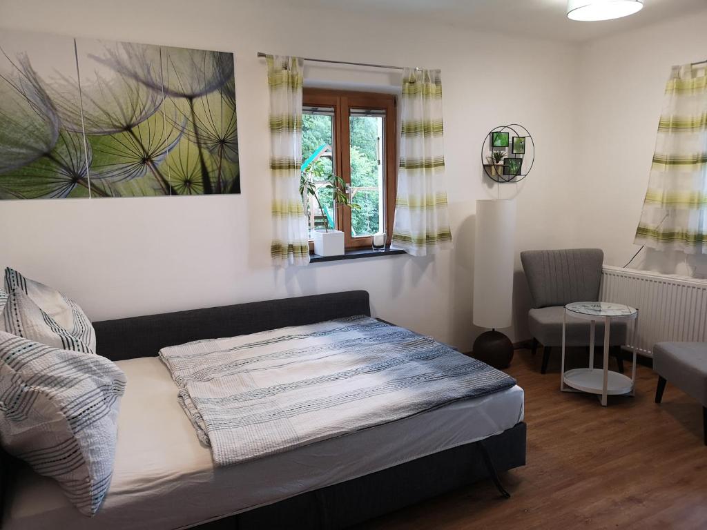 Postel nebo postele na pokoji v ubytování LaWie am Attersee