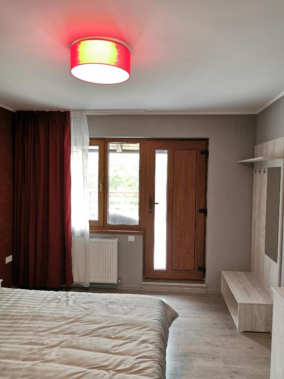 Postel nebo postele na pokoji v ubytování BBS Residence