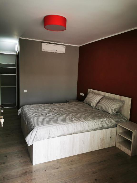 Postel nebo postele na pokoji v ubytování BBS Residence