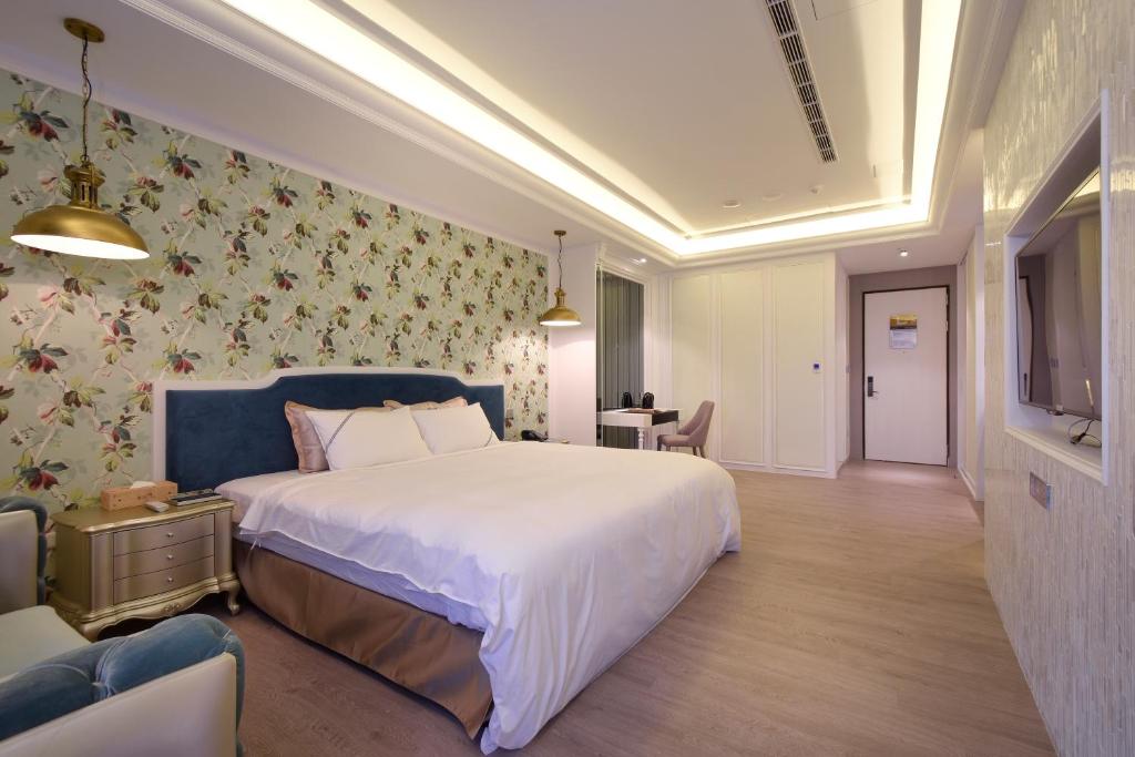 Katil atau katil-katil dalam bilik di U-Her Hotel