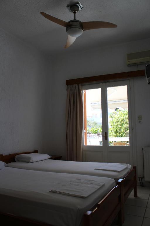 Postel nebo postele na pokoji v ubytování Villa Angela