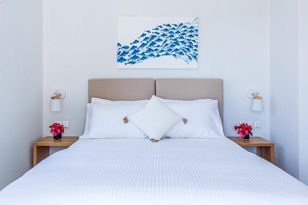 Postel nebo postele na pokoji v ubytování Elios Private Living