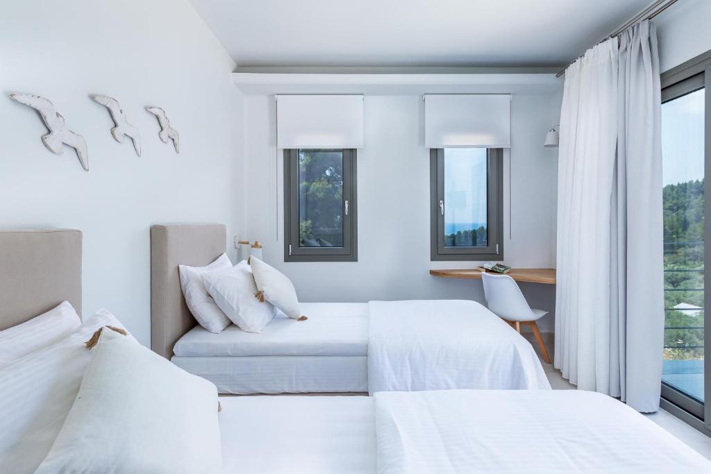 Postel nebo postele na pokoji v ubytování Elios Private Living