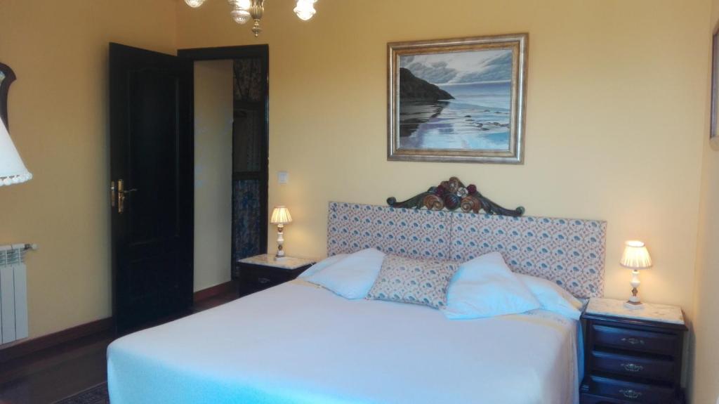 Postel nebo postele na pokoji v ubytování Hotel Rural El Pagadín