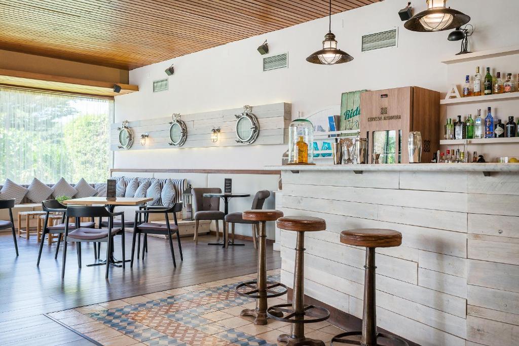 Nápoje v ubytovaní Hotel Alga