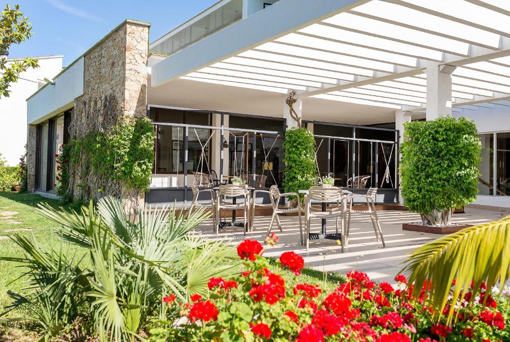 Vonkajšia záhrada v ubytovaní Hotel Alga
