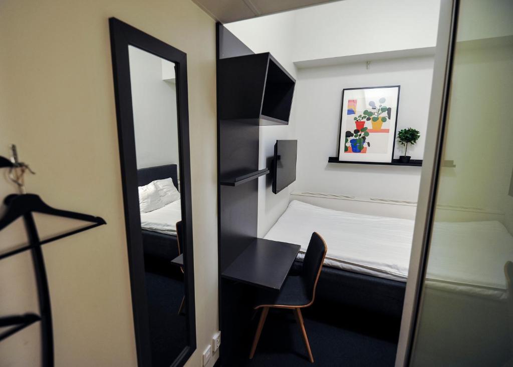 Postel nebo postele na pokoji v ubytování Moment Hotels