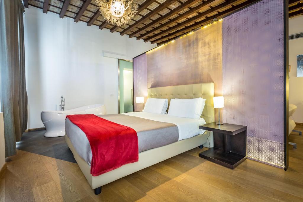 Postel nebo postele na pokoji v ubytování Hotel La Scaletta al Ponte Vecchio