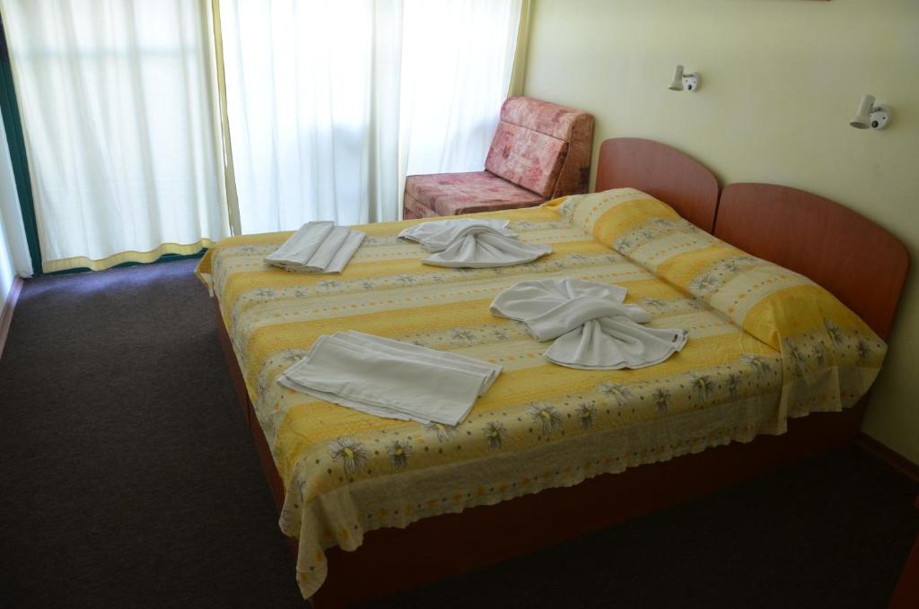 Postel nebo postele na pokoji v ubytování Hotel Nimfa-Rusalka