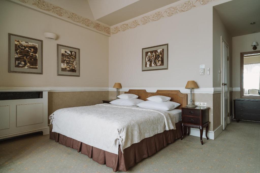 Posteľ alebo postele v izbe v ubytovaní Art Hotel