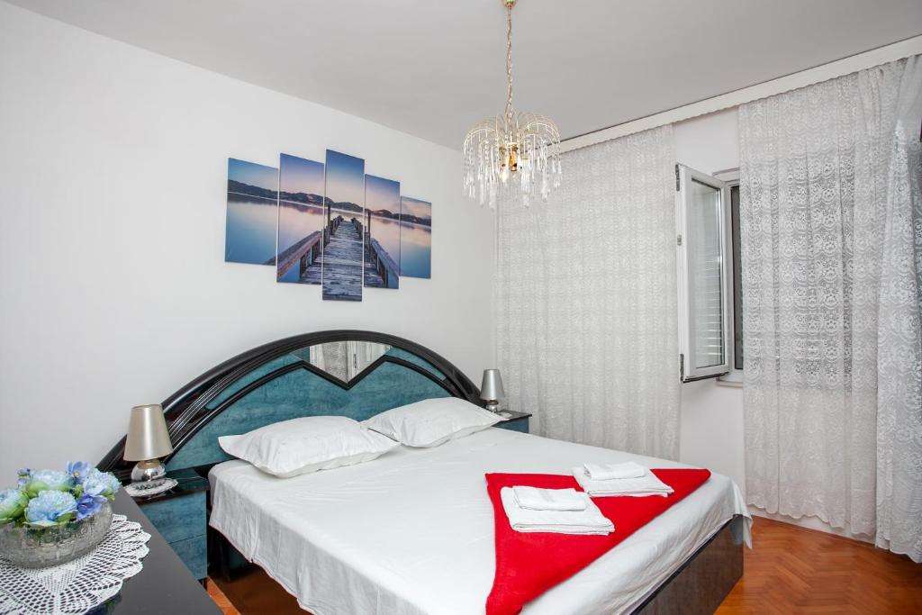 A bed or beds in a room at AP MARIJANA