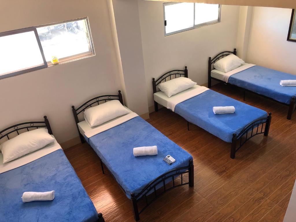 Postel nebo postele na pokoji v ubytování Havendwell Garden Resort