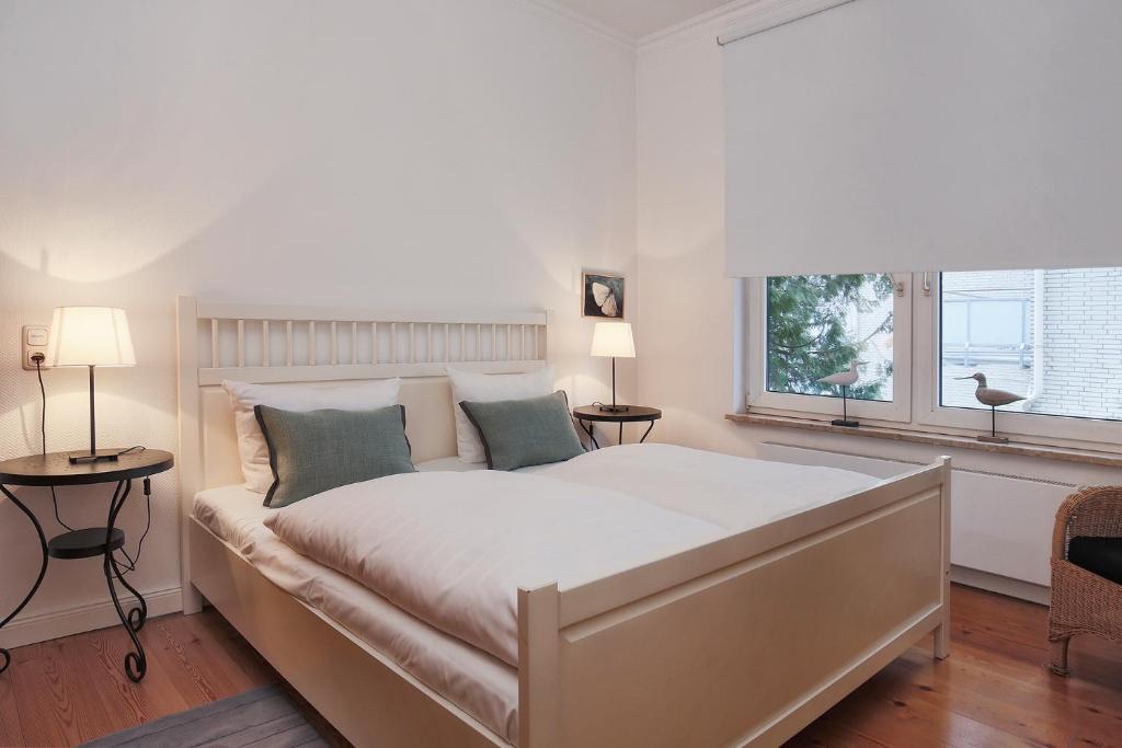 Postel nebo postele na pokoji v ubytování Villa An Der See