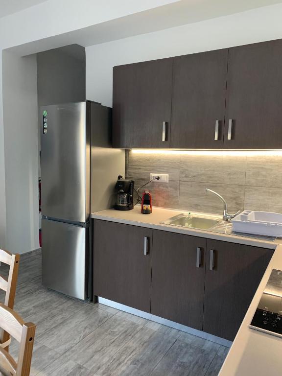 Kuchyň nebo kuchyňský kout v ubytování Melita Apartment Seaside