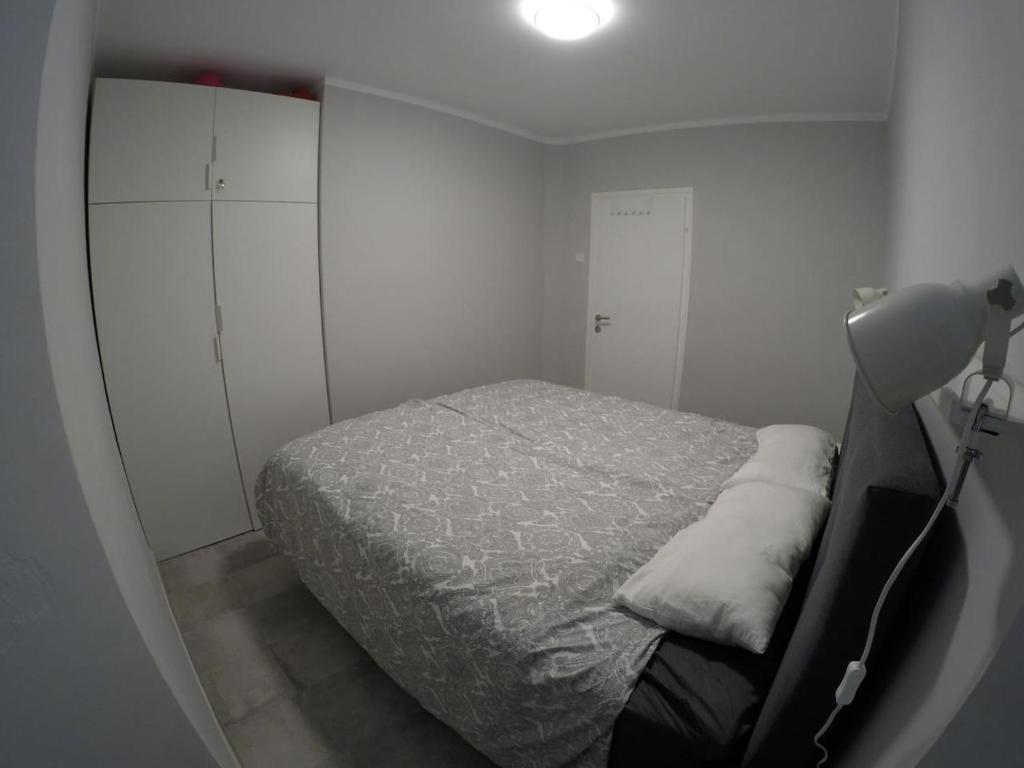 Postel nebo postele na pokoji v ubytování Apartment Galera