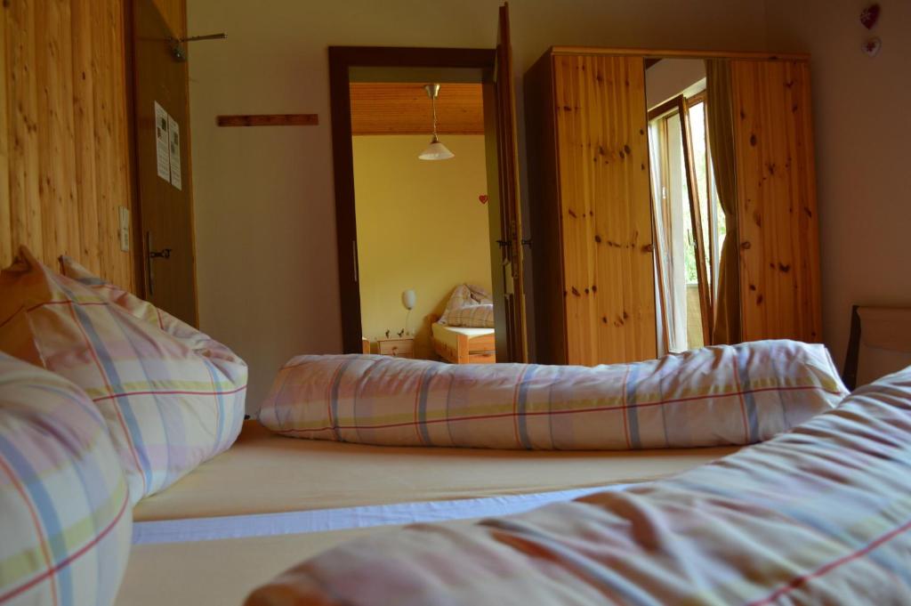 Postel nebo postele na pokoji v ubytování Chalet Kammleitn