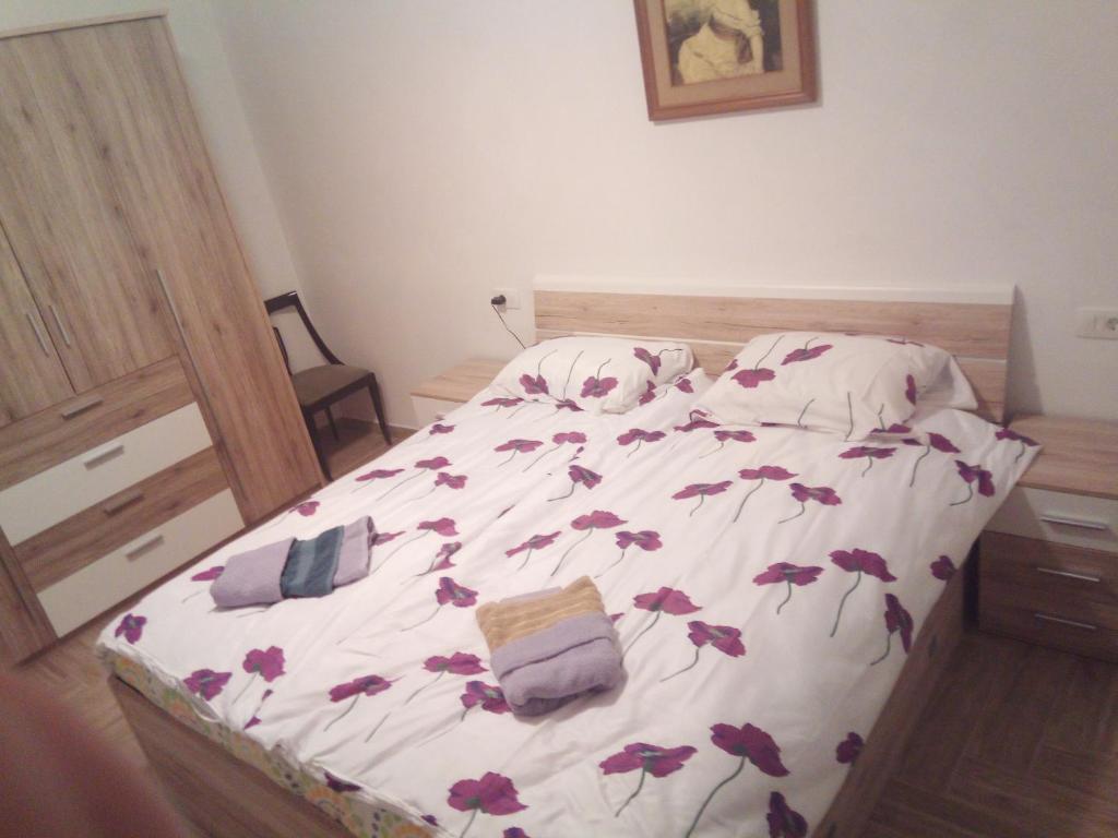 Postel nebo postele na pokoji v ubytování APARTMAJI MATAŽIN