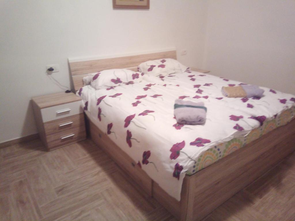 Postel nebo postele na pokoji v ubytování APARTMAJI MATAŽIN