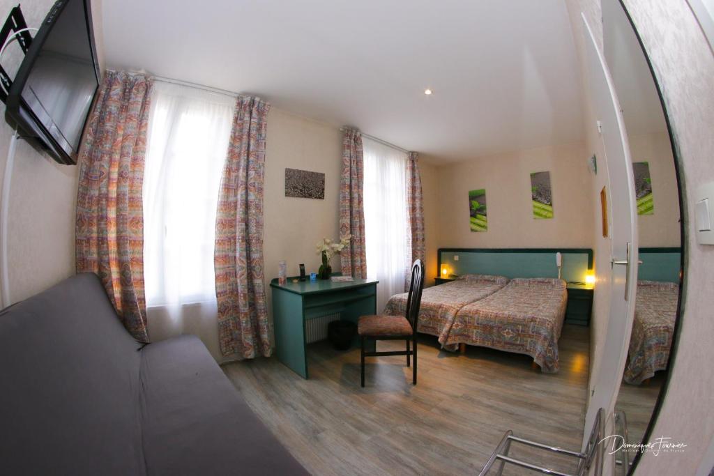 Postel nebo postele na pokoji v ubytování hotel des 2 nations