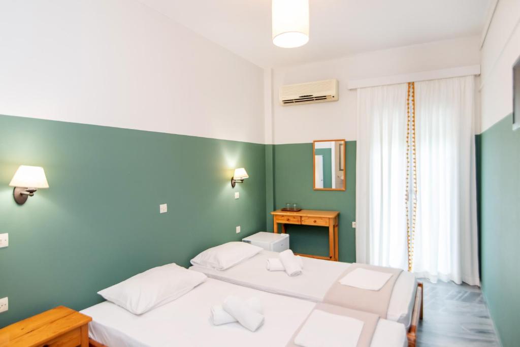 Postel nebo postele na pokoji v ubytování Flora
