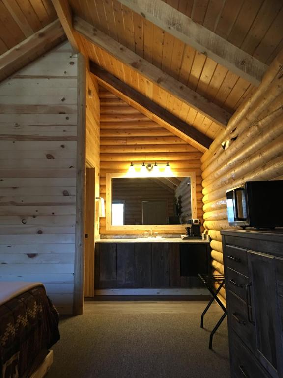 Kuchyň nebo kuchyňský kout v ubytování Countryside Cabins