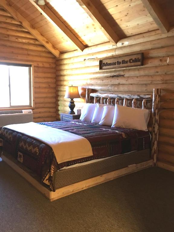 Postel nebo postele na pokoji v ubytování Countryside Cabins