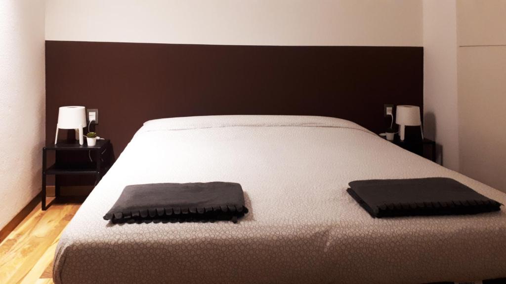 Łóżko lub łóżka w pokoju w obiekcie Residenza Nagler