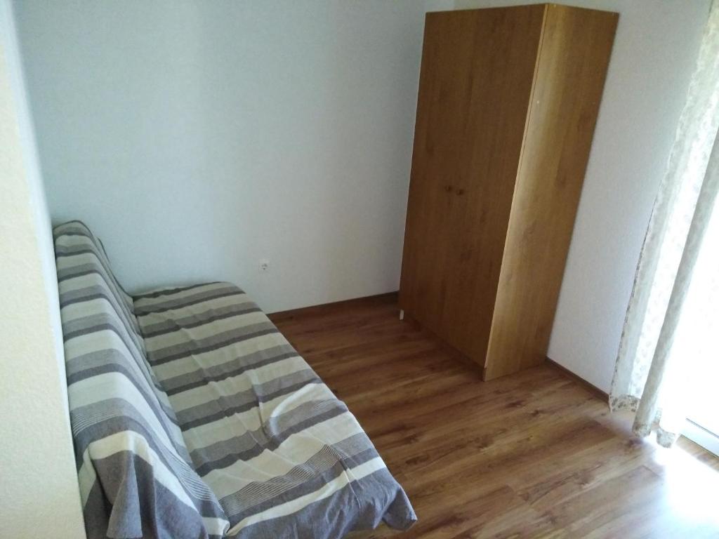 Posteľ alebo postele v izbe v ubytovaní Apartman Rodić