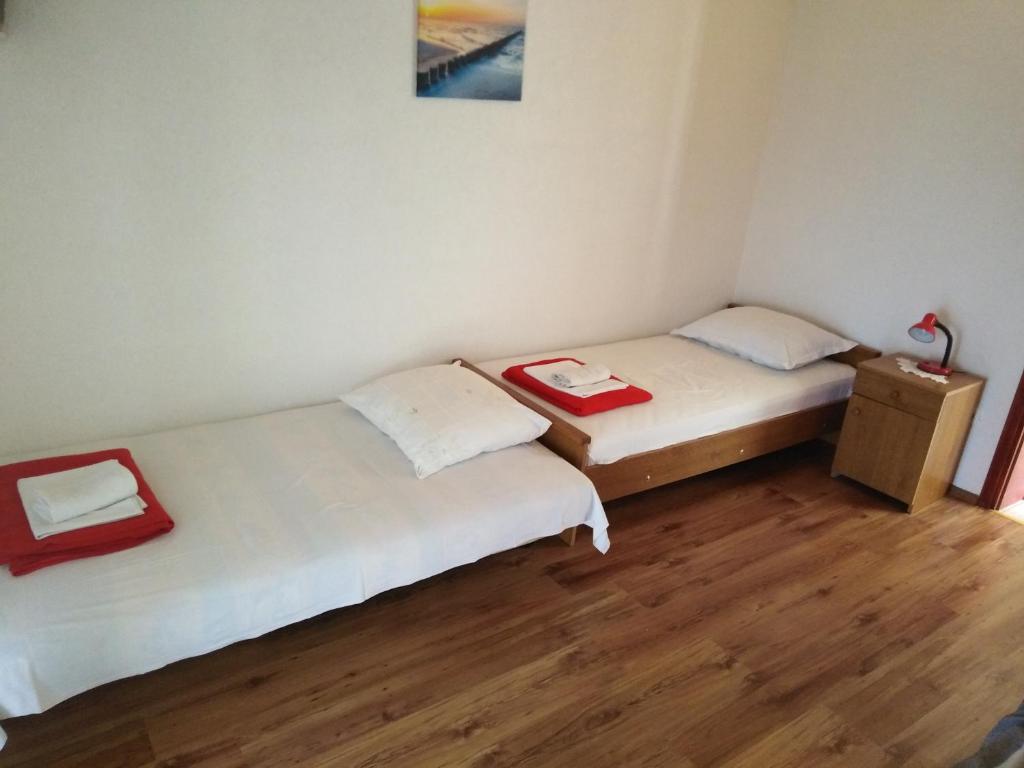 Posteľ alebo postele v izbe v ubytovaní Apartman Rodić