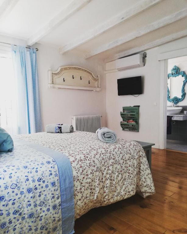 Łóżko lub łóżka w pokoju w obiekcie Alojamiento San Juan Bautista