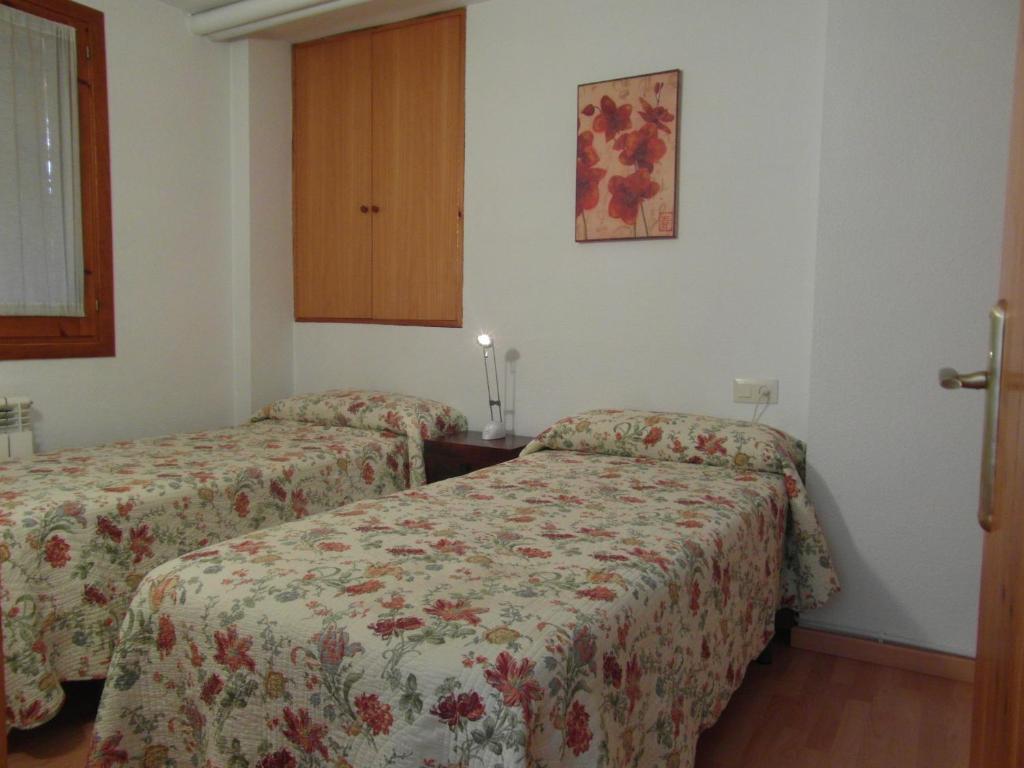Postel nebo postele na pokoji v ubytování B14 - Edif Ribagorza 2º - Villmor